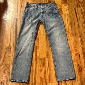 Levi’s 501 Jeans with Peace Sign 
150th year